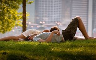 couple-relaxing-grass
